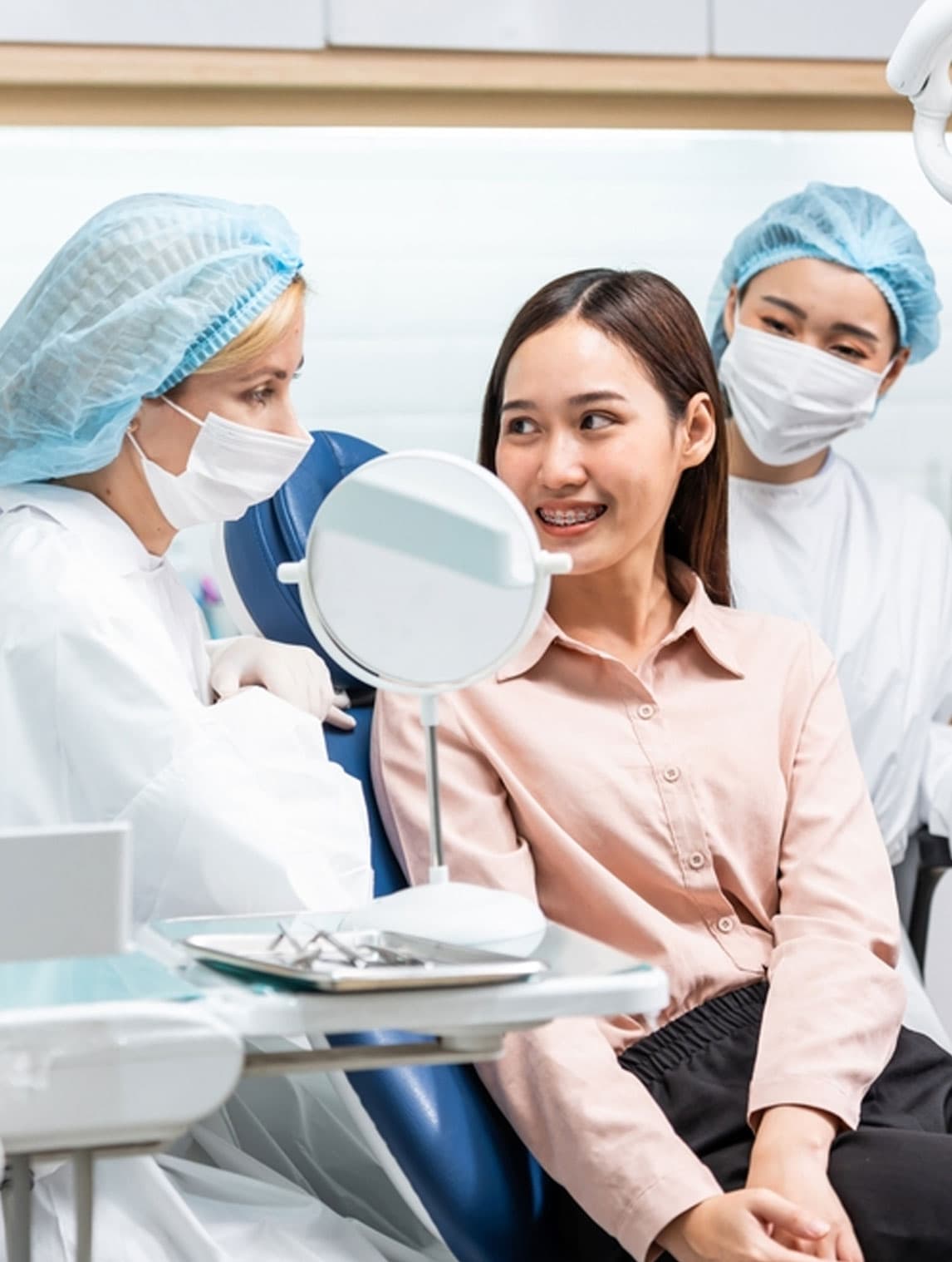 Dentist examining a patient in Milpitas